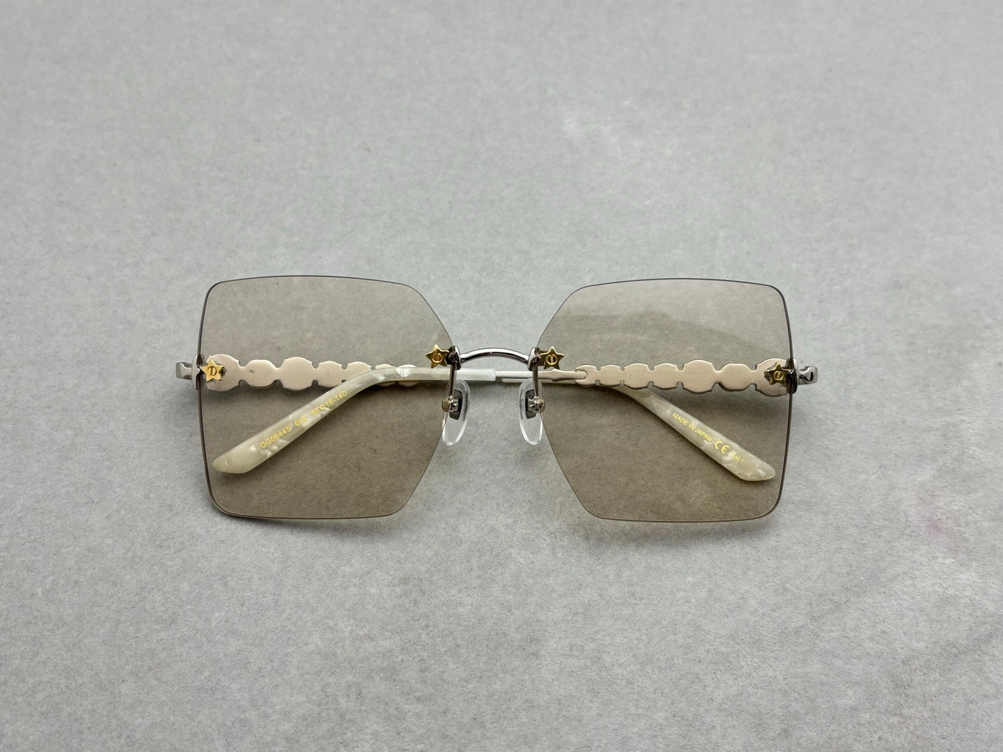 GUCCI GG0644S 女款無框太陽眼鏡 五角星鑲嵌水晶鑽石 size：56-16-140