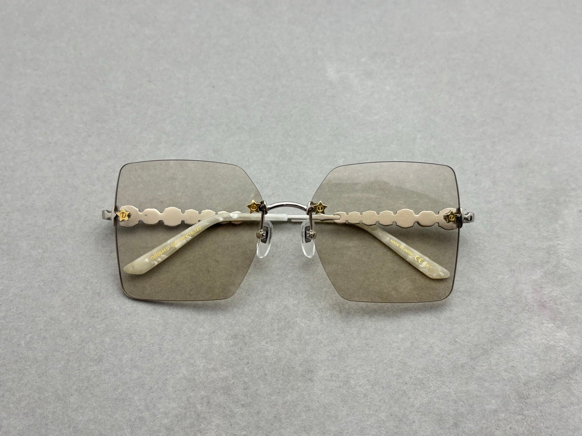 GUCCI GG0644S 女款無框太陽眼鏡 五角星鑲嵌水晶鑽石 size：56-16-140